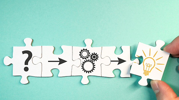 © KOFA Puzzleteile, die ineinander greifen